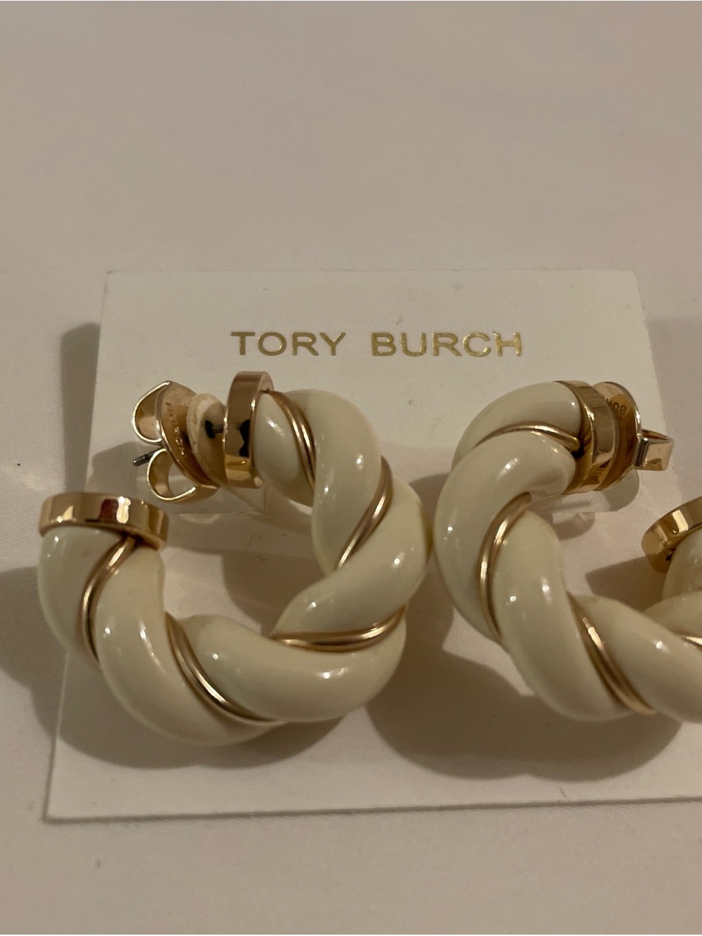 Tory Burch Cream Enamel Twisted Hoop Earrings with Gold Accents